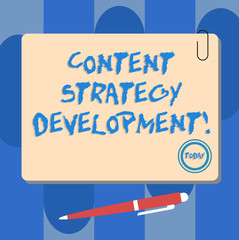 Writing note showing Content Strategy Development. Business photo showcasing setting some goals for the marketing content Square Color Board with Magnet Click Ballpoint Pen and Clip