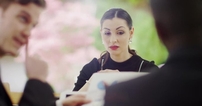 4K Nervous businesswoman sitting in silence at job interview. Slow motion.