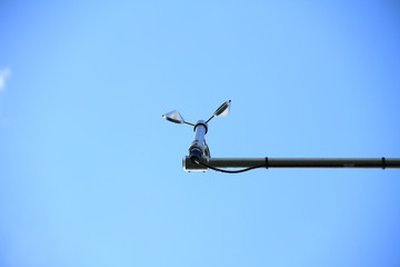 An anemometer is a device used for measuring wind speed, and is also a common weather station...