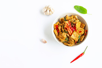 Stir-fried hot and spicy pork with basil on white