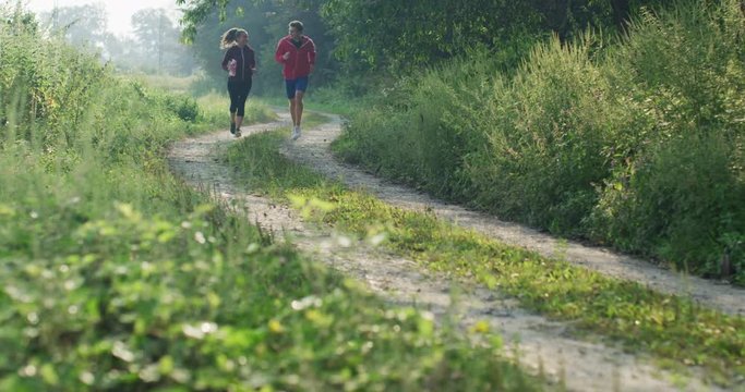 couple preparing for marathon in the nature