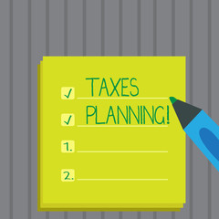 Conceptual hand writing showing Taxes Planning. Business photo showcasing Financial Planning Taxation Business Payments Prepared