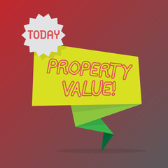 Conceptual hand writing showing Property Value. Business photo text Estimate of Worth Real Estate Residential Valuation