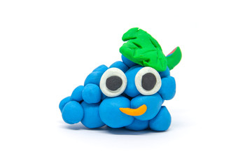 Play dough grape on white background. Handmade clay plasticine