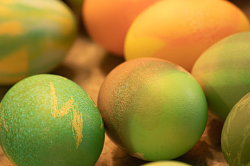 many multicolored eggs with patterns decorated and dyed for easter
