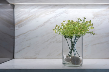 Flower in the vases glass on marble shelves interior decoration contemporary