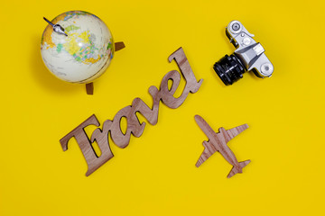 .Travel planning concept. Items on a yellow background.