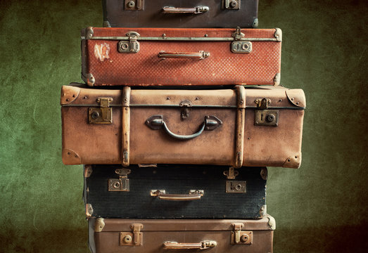 Antique retro pile of suitcases in stack. Vintage © olga pink
