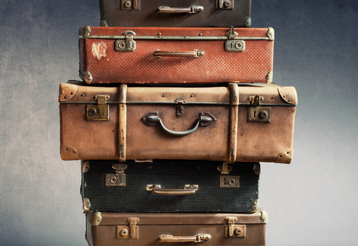 Antique retro pile of suitcases in stack. Vintage © olga pink