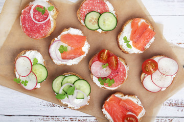 Top view on different sandwiches, flat lay