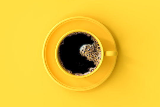 Coffee in yellow cup.