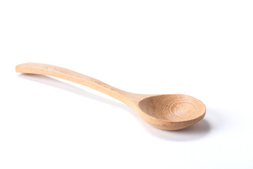 Close up Wood spoon isolated on white background shoot in the studio with space for copy.