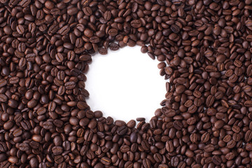 Background from top view with space for copy of coffee beans on white.