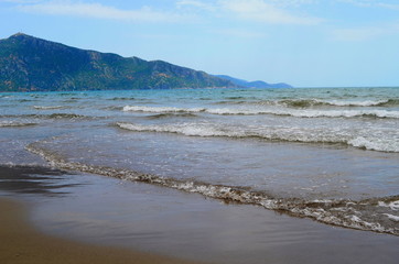 waves on the Mediterranean Sea on the shore of a turtle island in Dalyan, Turkey