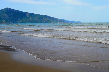 waves on the Mediterranean Sea on the shore of a turtle island in Dalyan, Turkey