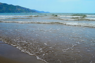 waves on the Mediterranean Sea on the shore of a turtle island in Dalyan, Turkey