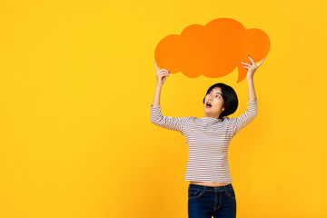 Young Asian woman in casual clothes with empty speech bubble