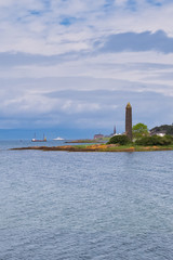 Largs Foreshore and the Pencil Monument Commemorating the Viking Battle of Largs in 1263.