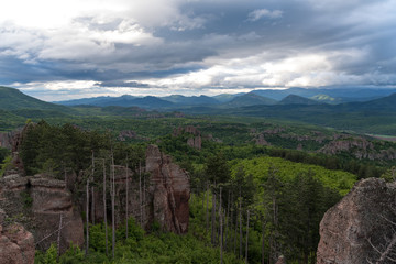 Fototapeta premium Mountains panorama of Belogradchik cliff rocks, nature gem landmark,.Bulgaria