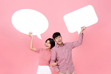 Lovely young Asian couple with speech bubbles