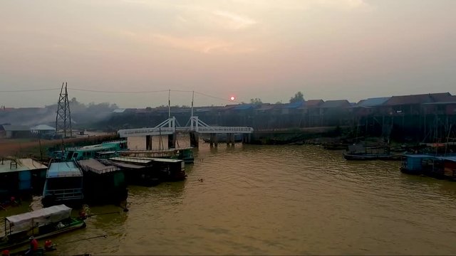 Sunrise view from the fishermen village.Aerial view of  fishermen village in kompong kleang, market view with crowded ,seam reap, cambodia.