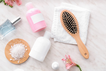Different cosmetics for personal hygiene on white table