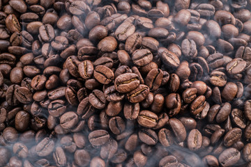 Roasted coffee beans. Food and drink background. Top view.