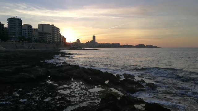 Lovely sea view from the promenade of Silema during sunset, Malta
