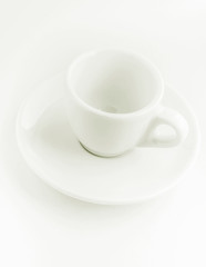 white coffee cup and saucer, empty coffee-free coffee cup, top side view, or black coffee, on a white background
