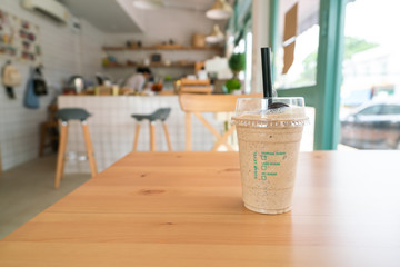 Coffee frappe on wooden table