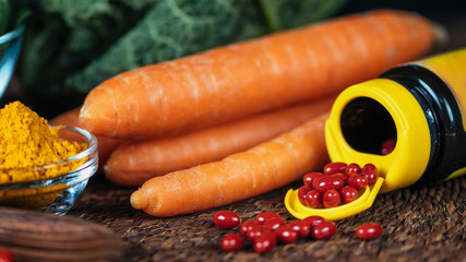 Beta Carotene Supplement Pills and Vegetables