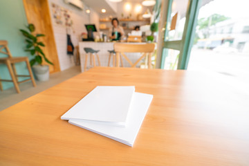 Blank catalog, magazines,book mock up on wood table