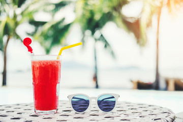 Juice on luxury swimming pool tropical beach resort , summer concept