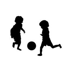 Two kids playing soccer