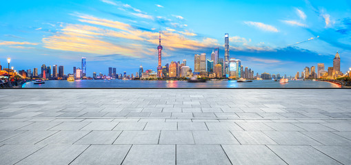 Shanghai skyline and modern city skyscrapers with empty floor at night,China
