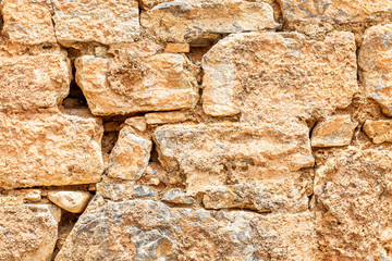 The texture of the stone wall, closeup. Background. Space for text.