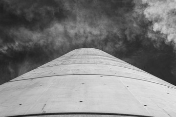 concrete pillar going to the sky black and white