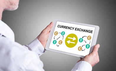 Currency exchange concept on a tablet
