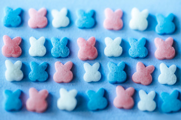 multicolored candy on a blue background