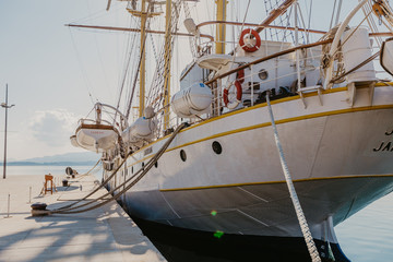 Obraz premium Tivat, Montenegro - 09.11.2018. Cruise ship in sea port, Embankment of Tivat city, Montenegro, in a sunny summer day