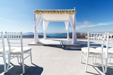 Beautifully arranged place for a wedding ceremony on the Greek coast. Romantic vacation by the sea