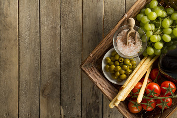 Wooden surface with basket and healthy products
