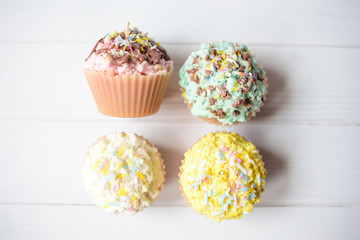 cute candles in the form of cakes pastel colors 