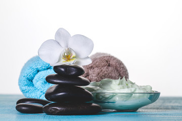 Spa decoration with volcanic stones and creme
