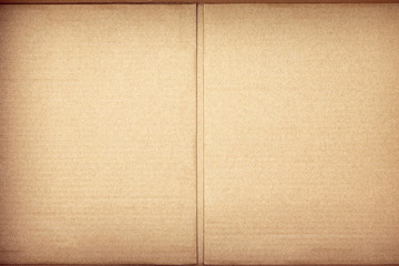 Brown paper texture or cardboard background. Surface of recycled paper material.