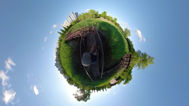 Ansan, South Korea - 07 june 2019 Walk in Ansan Waterside Park. Little Planet View with blue sky and green forest.