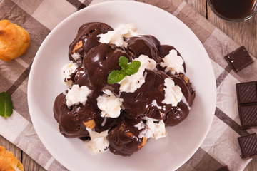 Chocolate profiteroles. 