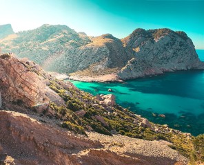 Beautiful coastline view of the mountain cliff with turquoise water beaches ant the wild nature. Cala Figuera, Serra de Tramuntana, Cap de Formentor, Mallorca, Spain