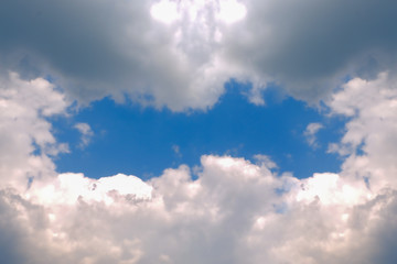 Clouds against a blue sky. Cloud frame.