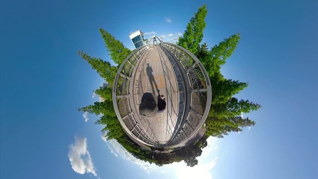 Ansan, South Korea - 07 june 2019 Walk in Ansan Waterside Park. Little Planet View with blue sky and green forest.